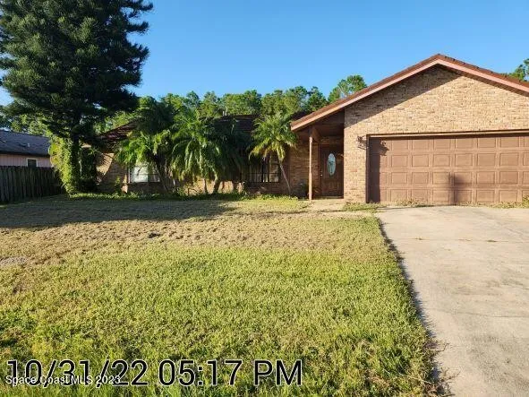 Home exterior repair before in Palm Bay, FL